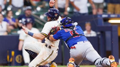 Left fielder Ian Happ saves Cubs with 2 late throws to plate in wild 7-6 win over Brewers in 11